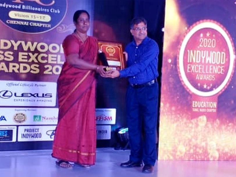 Dr. V. Nagarani receiving the 2020 Indywood Excellence Award for Education