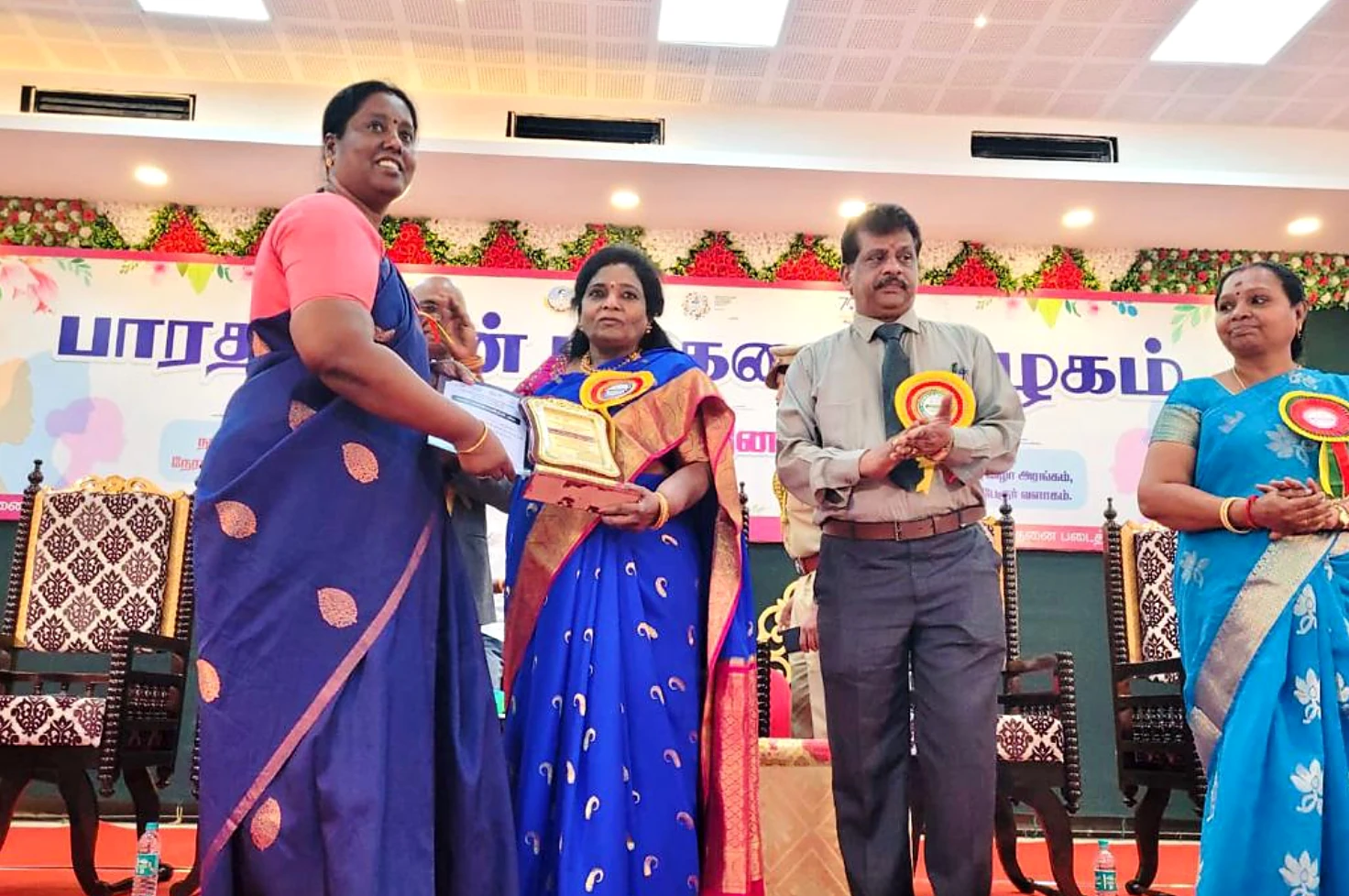Dr. V. Nagarani receiving the Munnodi Penmani award from Bharathidasan University