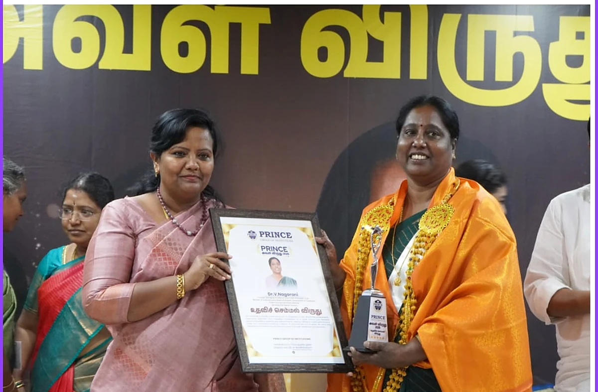 Dr. V. Nagarani receiving the Prince Aval Viruthu 2025 certificate and trophy