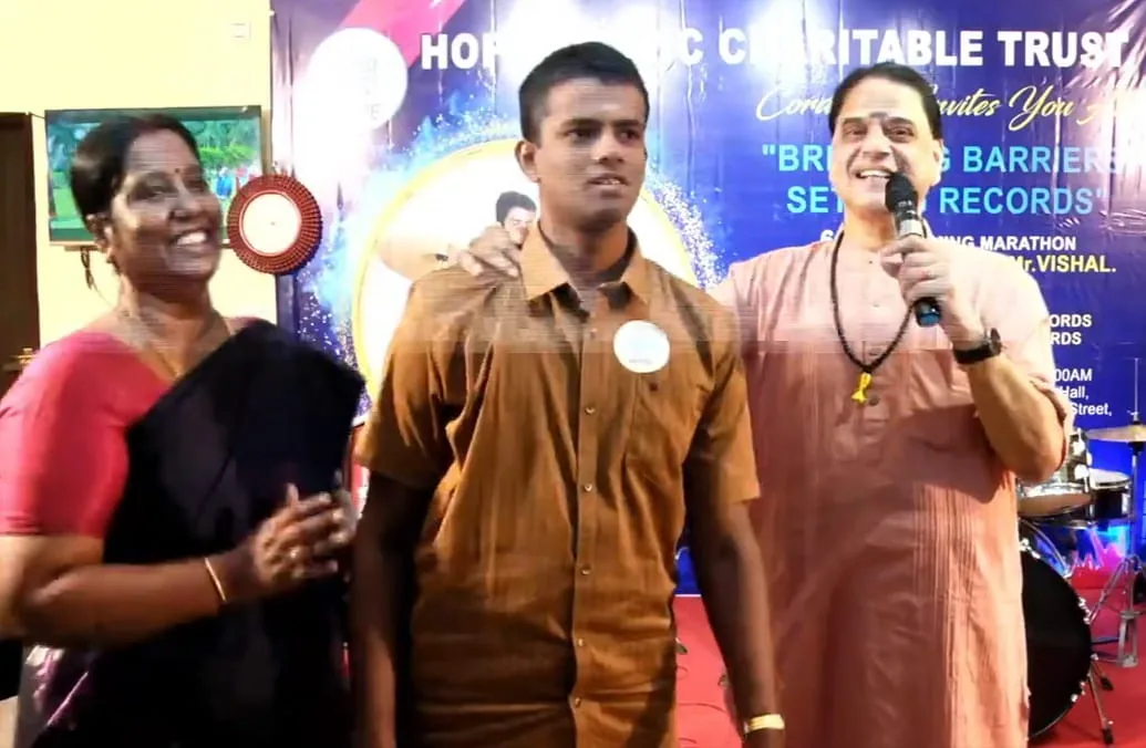 Student drummer with guests on stage at Hope Chennai's Breaking Barriers event