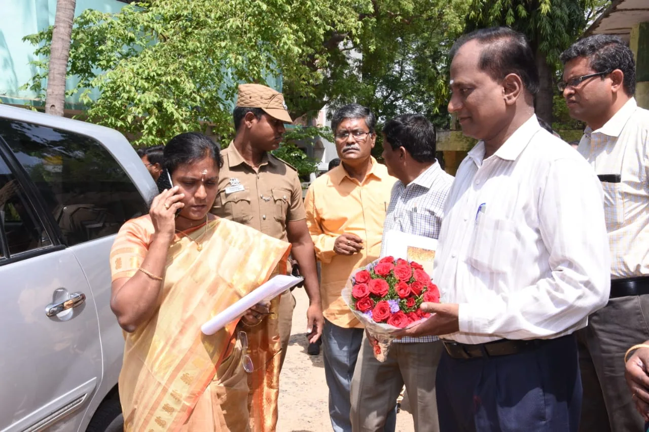 Guests welcomed with flowers at a Tamil Nadu disability welfare event