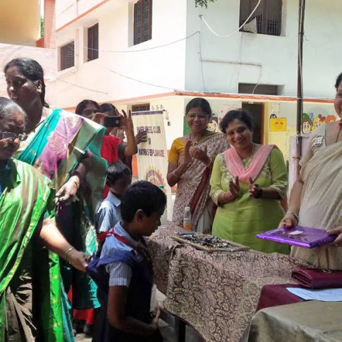 Children and staff at an activity stall at Hope Chennai