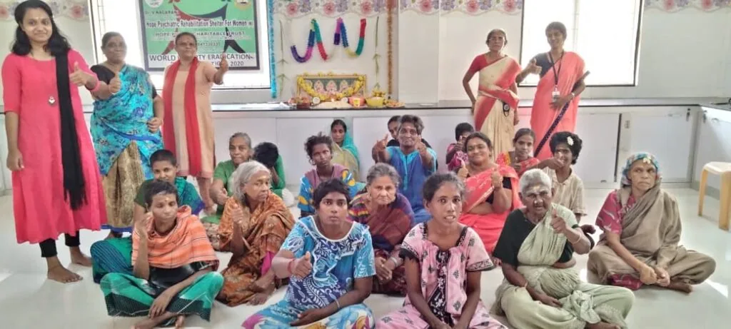 Women residents seated together at Hope Chennai's women's shelter