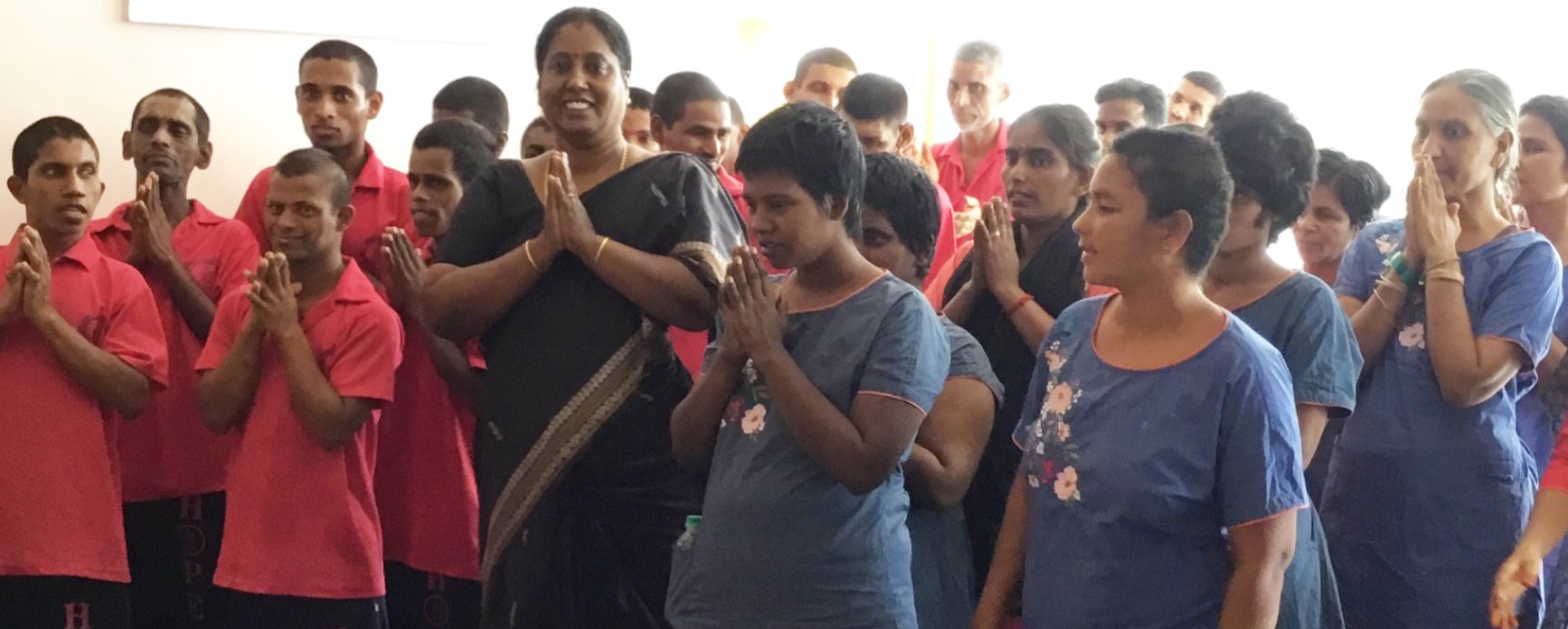 Hope Chennai founder greeting residents together with folded hands